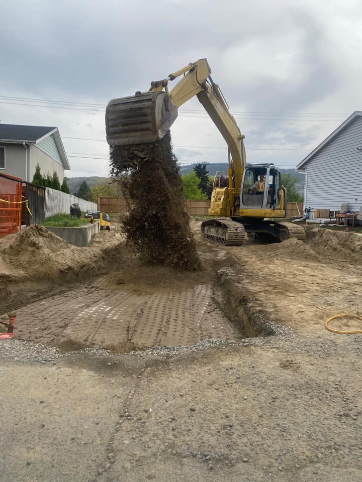 Kamloops Trenching Services operating heavy machinery for a project